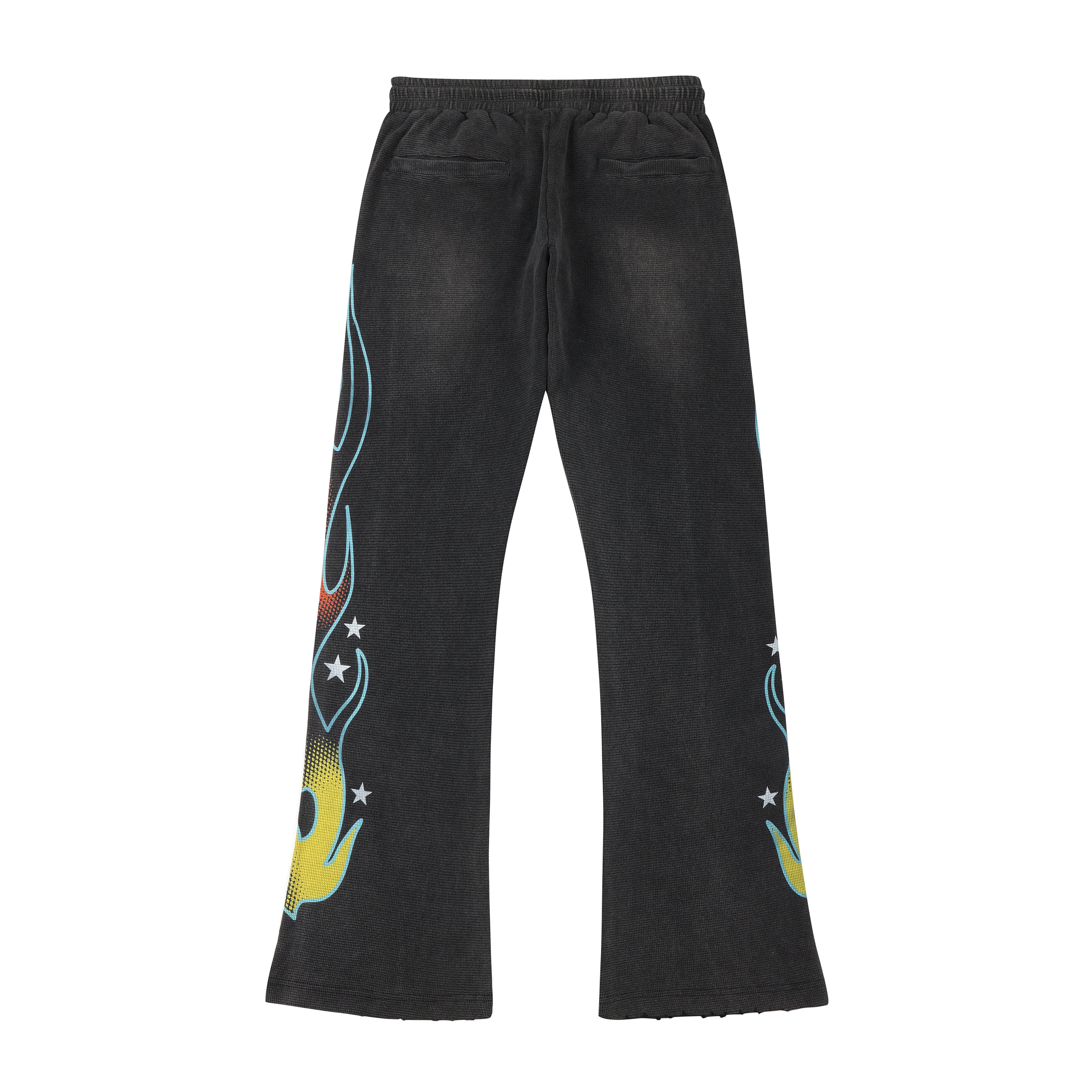 ALMOST SOMEDAY Outward Thermal Flares in Vintage Black, on-figure front view showing flame graphic running up both legs and cream rope drawstring
