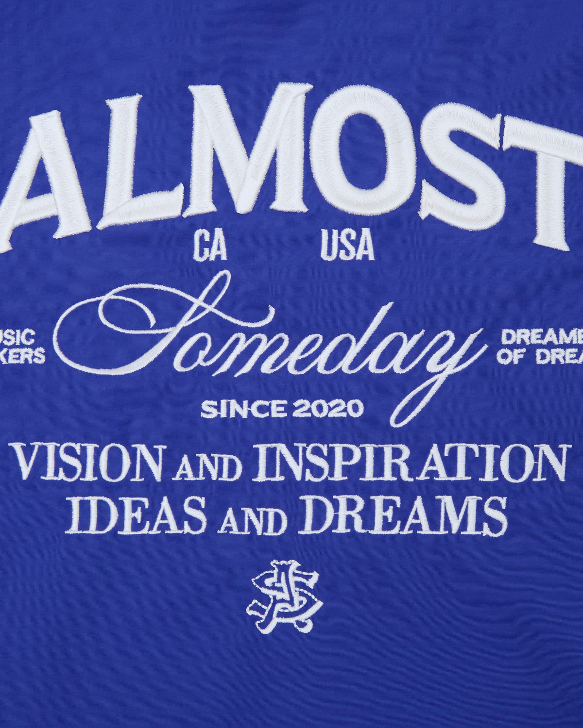 Blue shorts with white text and graphics on a blue background