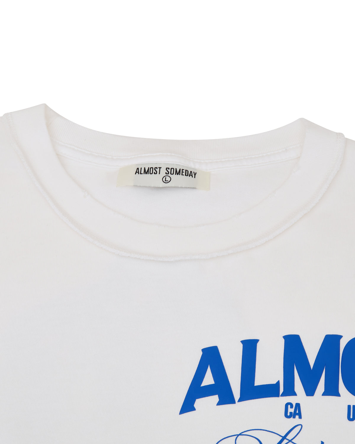 White shirt with blue text 'ALMOST' and a visible brand label on a white background