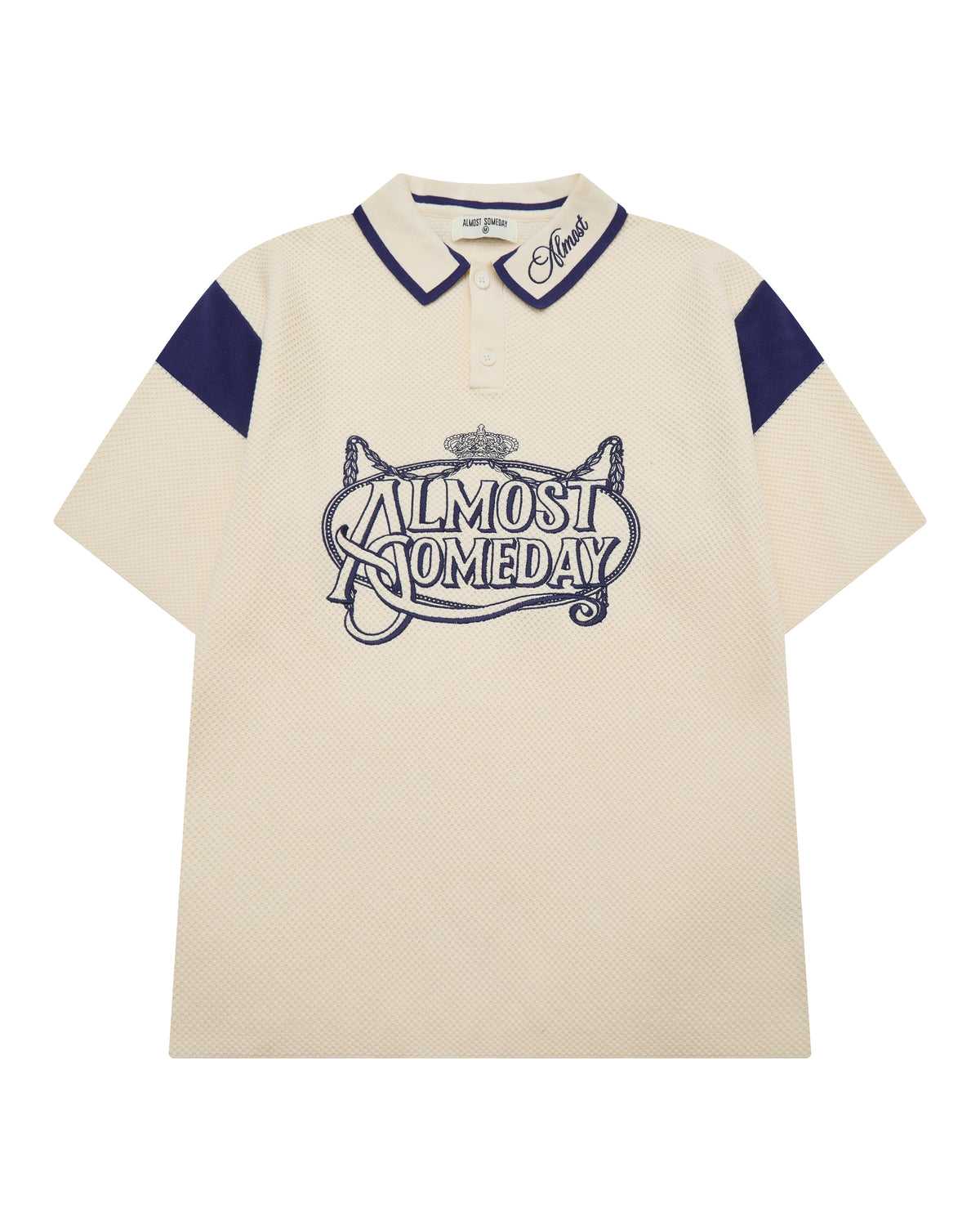 Beige polo shirt with blue accents and 'Almost Someday' logo on a white background