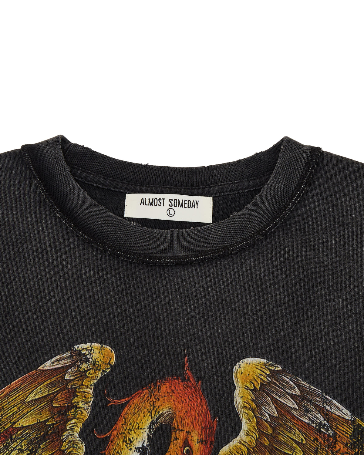 Black t-shirt with a dragon graphic and 'Almost Someday' label on a white background