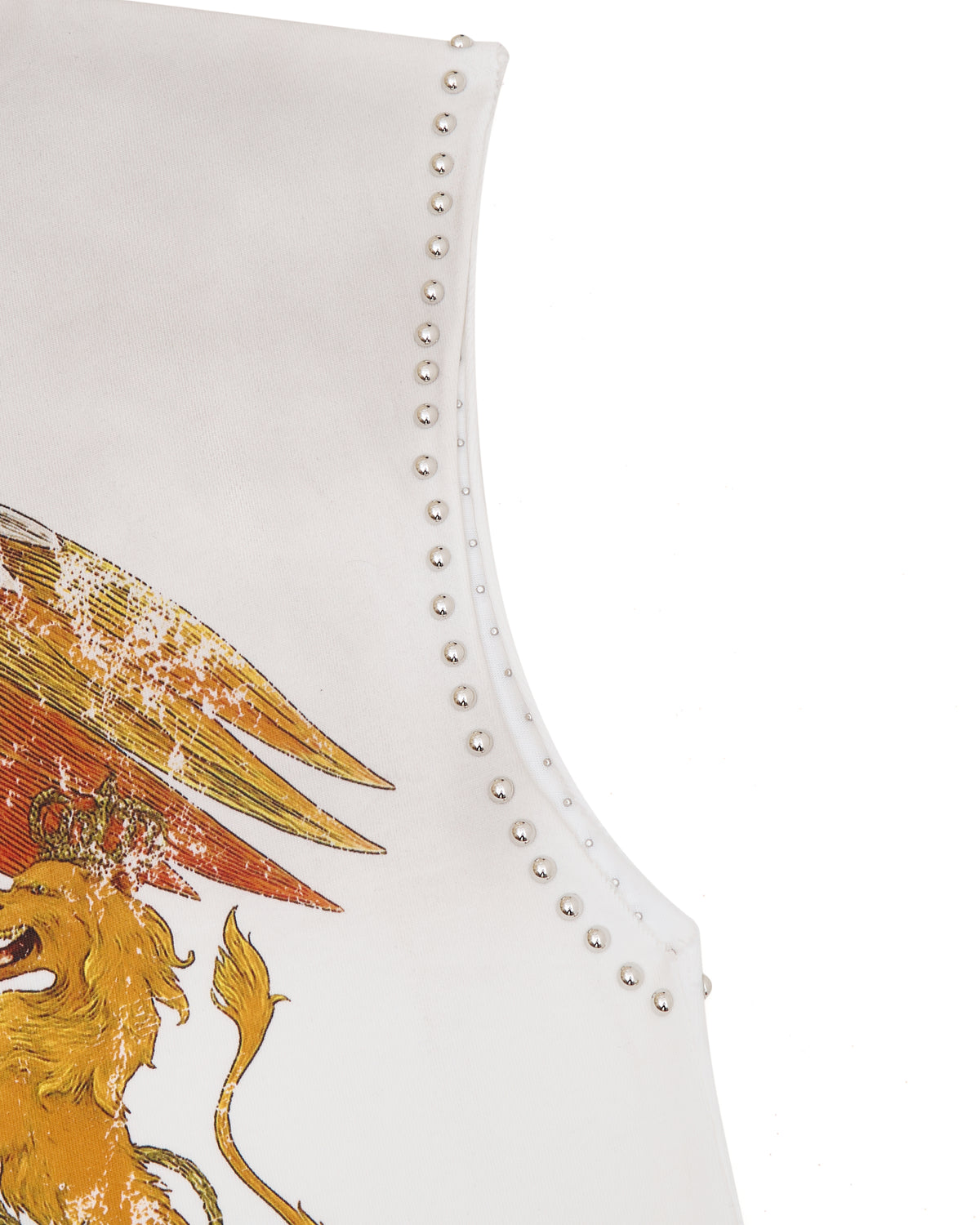 White garment with gold lion and eagle design and studded details on a white background