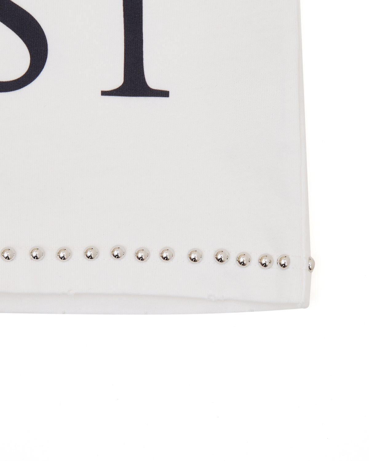 White clutch with studded details on a white background