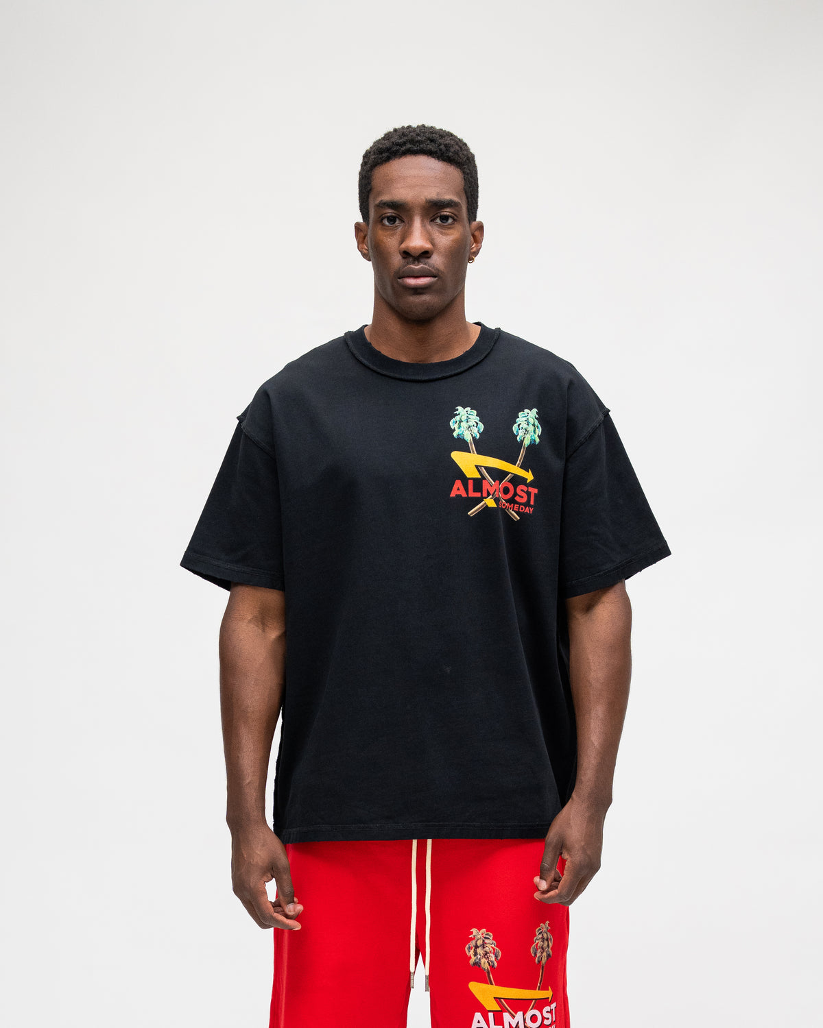 ALMOST SOMEDAY Drive Thru Tee in Black, front view