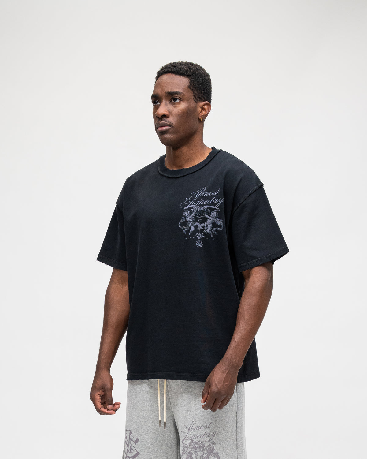 ALMOST SOMEDAY Flourish Tee in Black, detail view