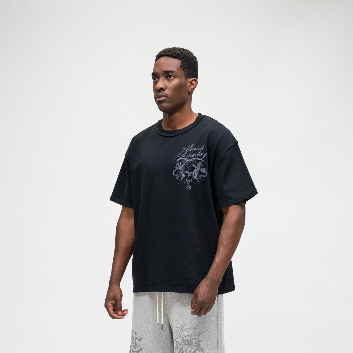 ALMOST SOMEDAY Flourish Tee in Black, detail view
