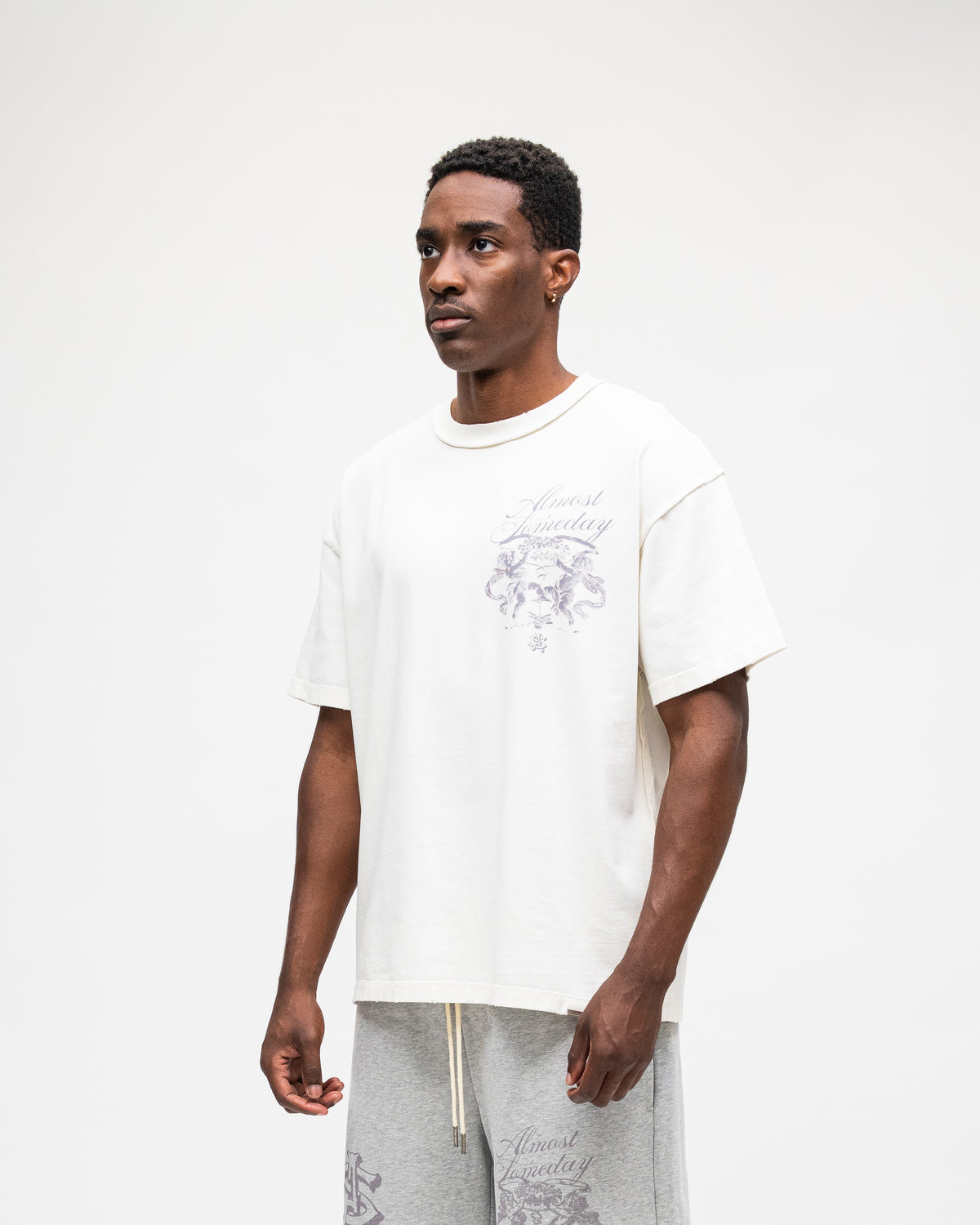 ALMOST SOMEDAY Flourish Tee in Cream, detail view