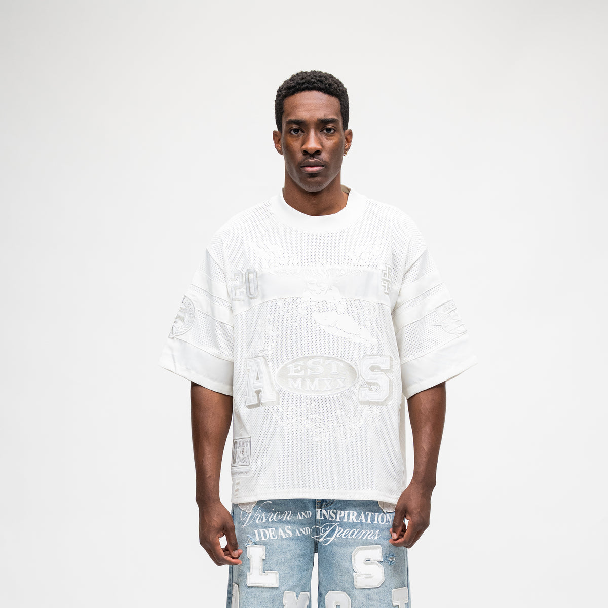 ALMOST SOMEDAY Letterman Jersey Top in Cream, front view showing tonal mesh construction and block letter appliqué branding