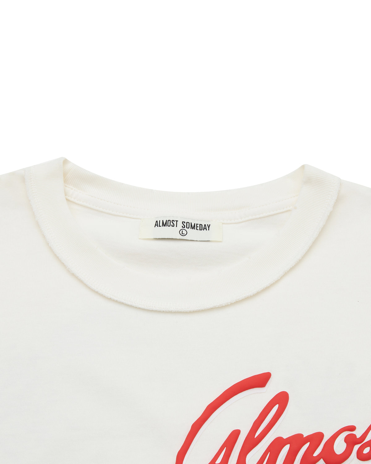 Cream t-shirt with red 'Almost' text and 'Almost Someday' label on a white background