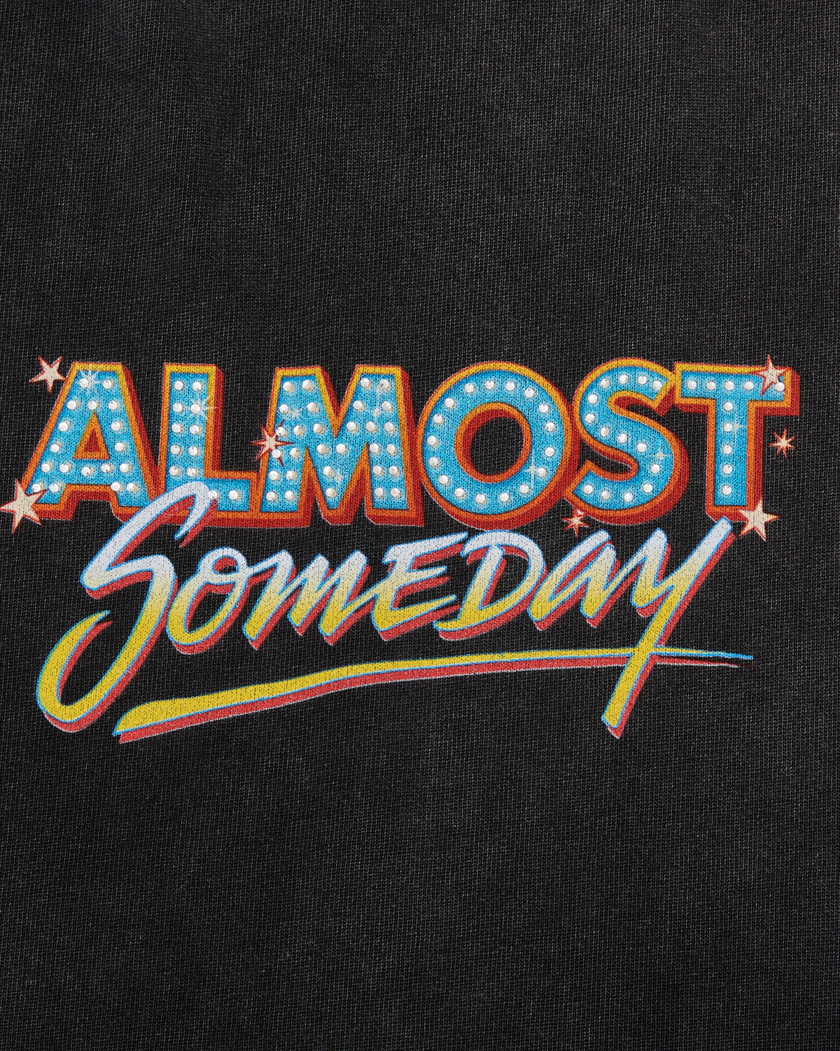 Text 'ALMOST Someday' on a black background with colorful design elements.