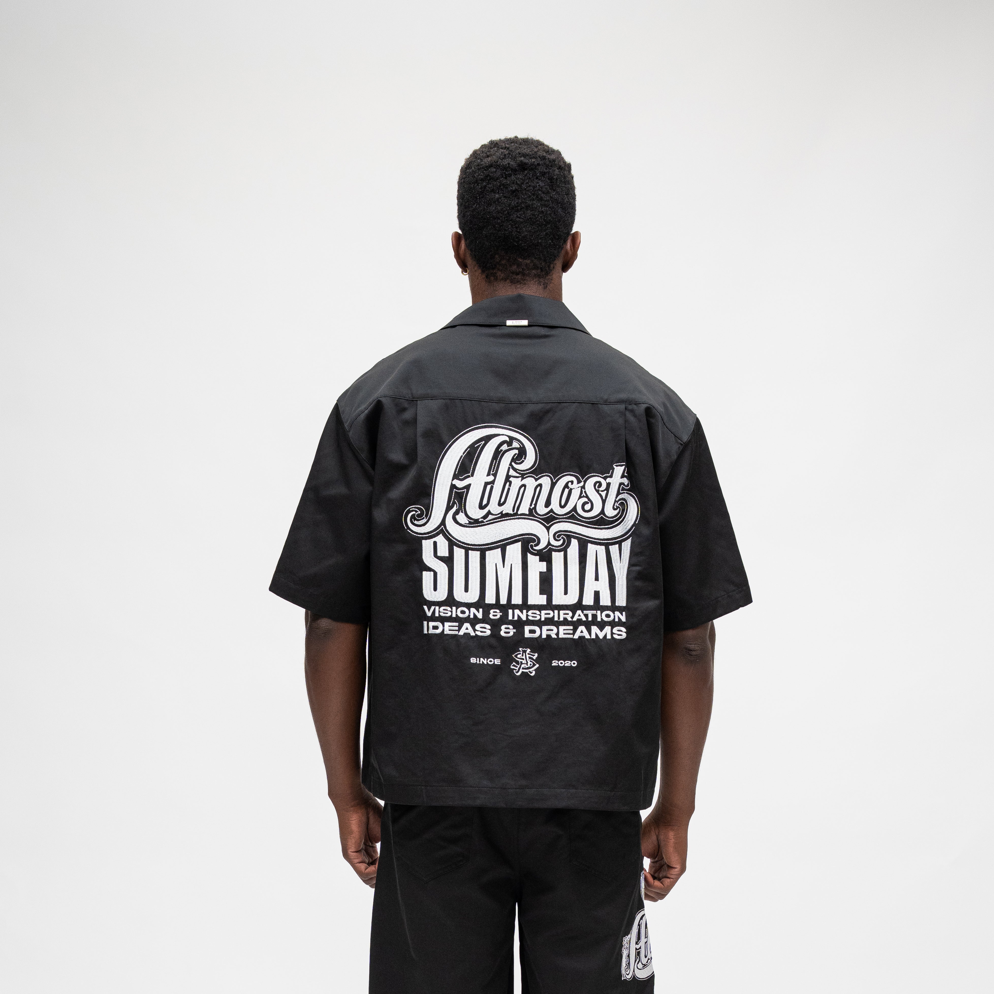 ALMOST SOMEDAY Vision Nylon Shirt in Black, back view with full-back Almost Someday graphic print