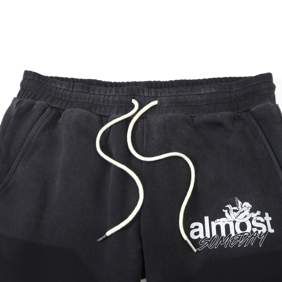 Enemies Flare Bottoms – Black – Close-up of elastic waistband, white drawstrings, side pockets, and thigh logo
