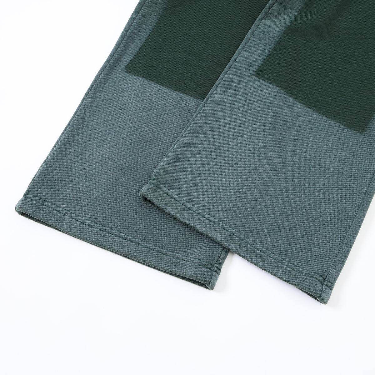 Enemies Flare Bottoms – Green – Close-up of stitched open hems and dark tonal leg panels