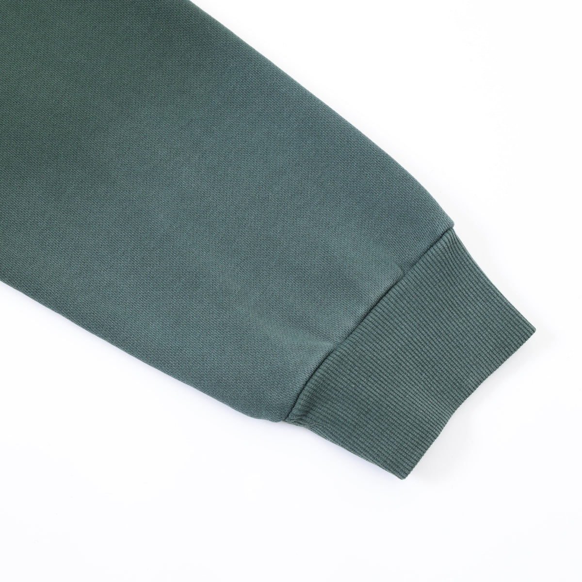 Enemies Zip Hoodie – Green – Close-up of sleeve and ribbed cuff