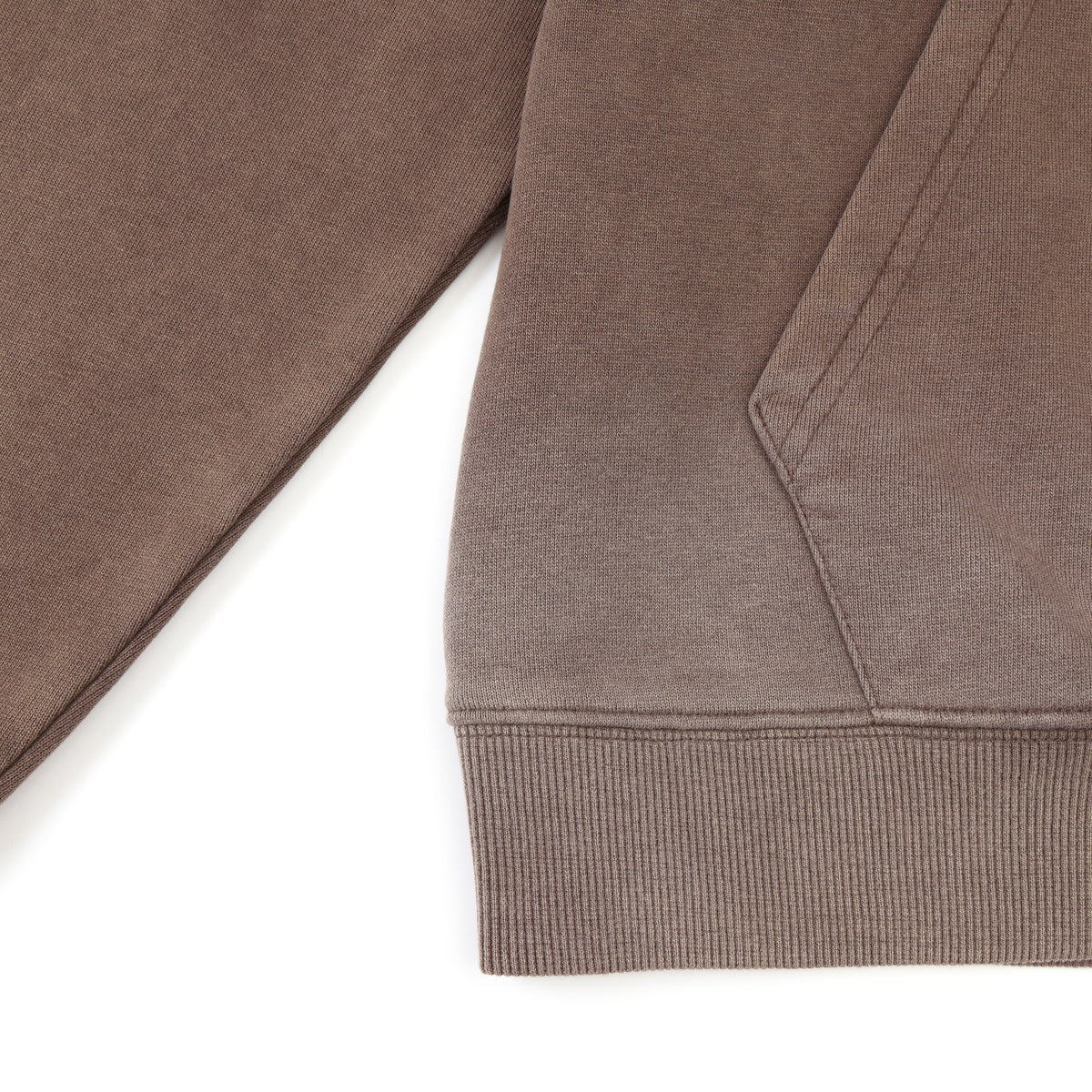 Fountain Hoodie – Brown – Close-up of ribbed hem, pocket edge, and lower sleeve