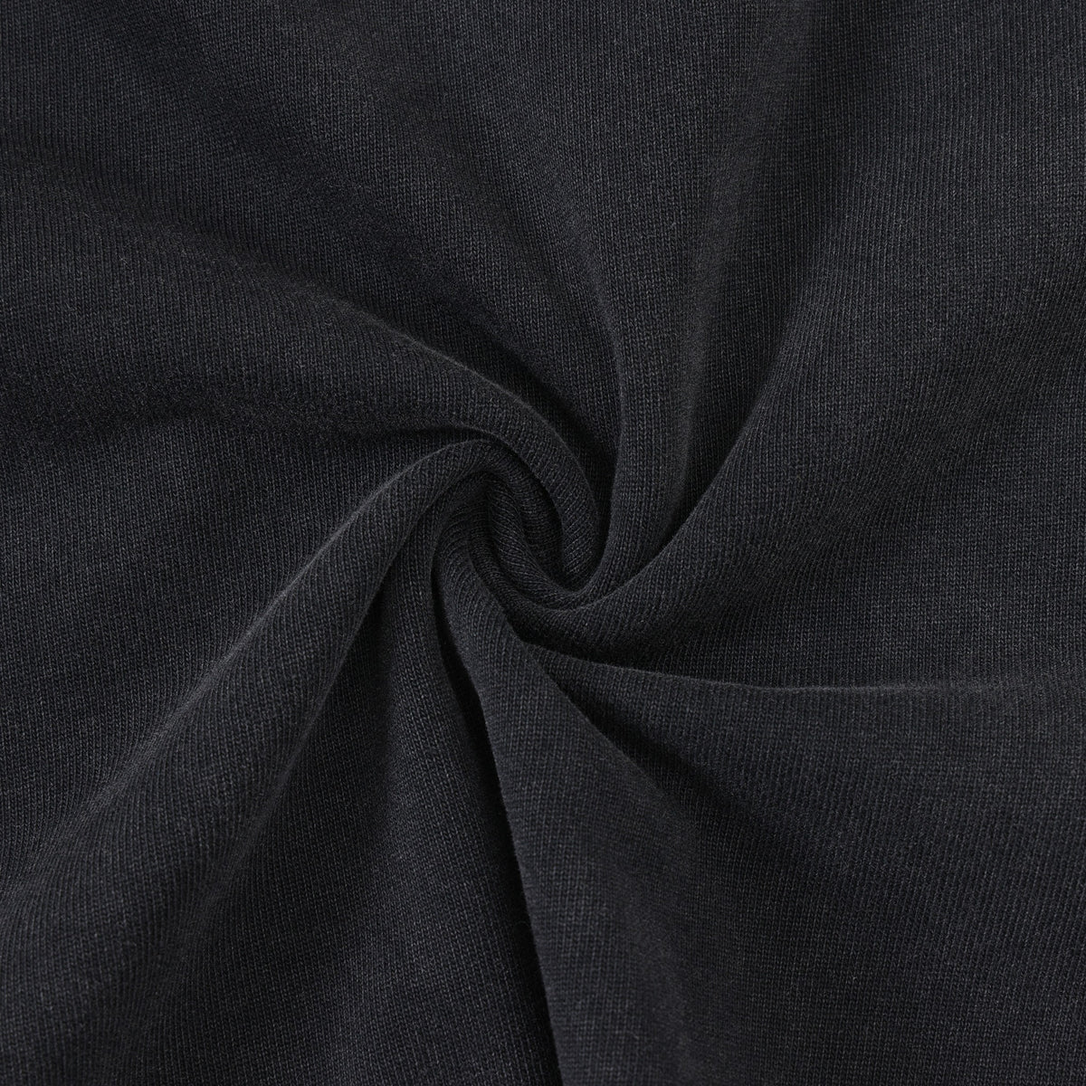 Fountain Tee – Black – Close-up of black fabric gathered to show knit texture
