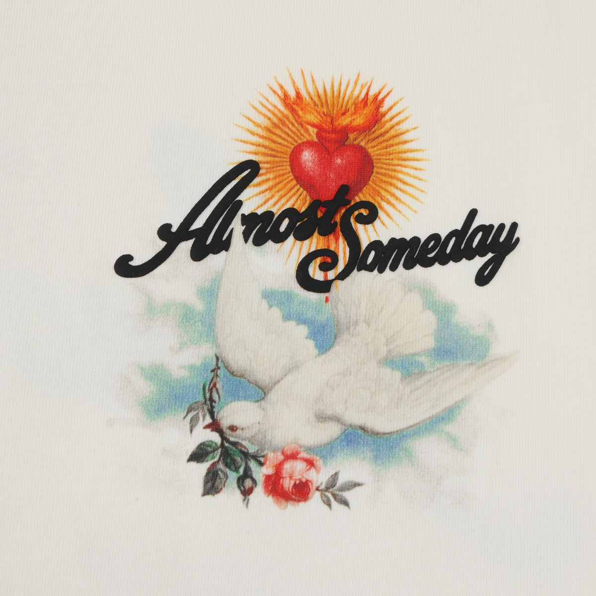 Fountain Tee – Cream – Close-up of chest graphic with dove, rose, heart, and ALMOST SOMEDAY lettering