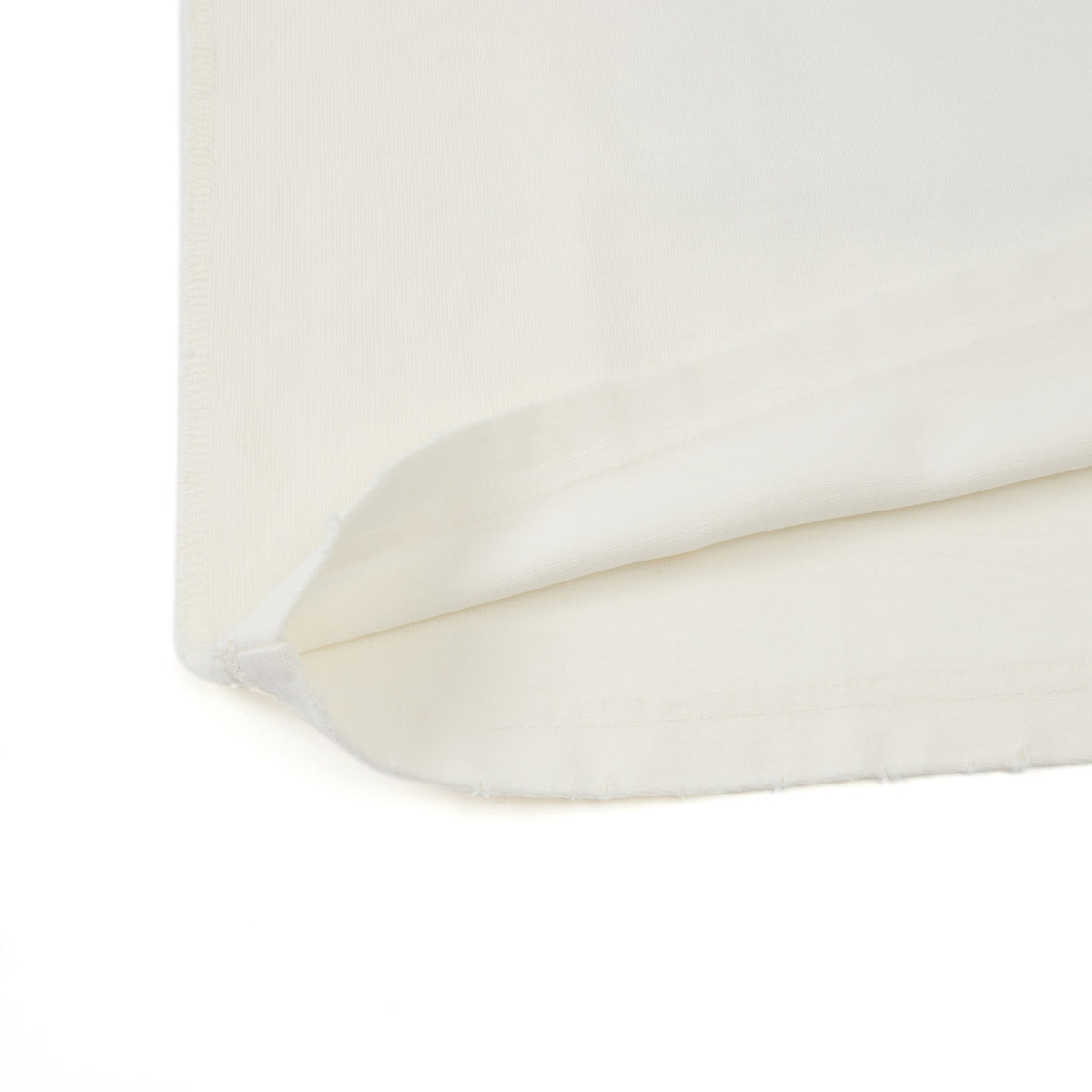 Fountain Tee – Cream – Close-up of folded hem and stitching