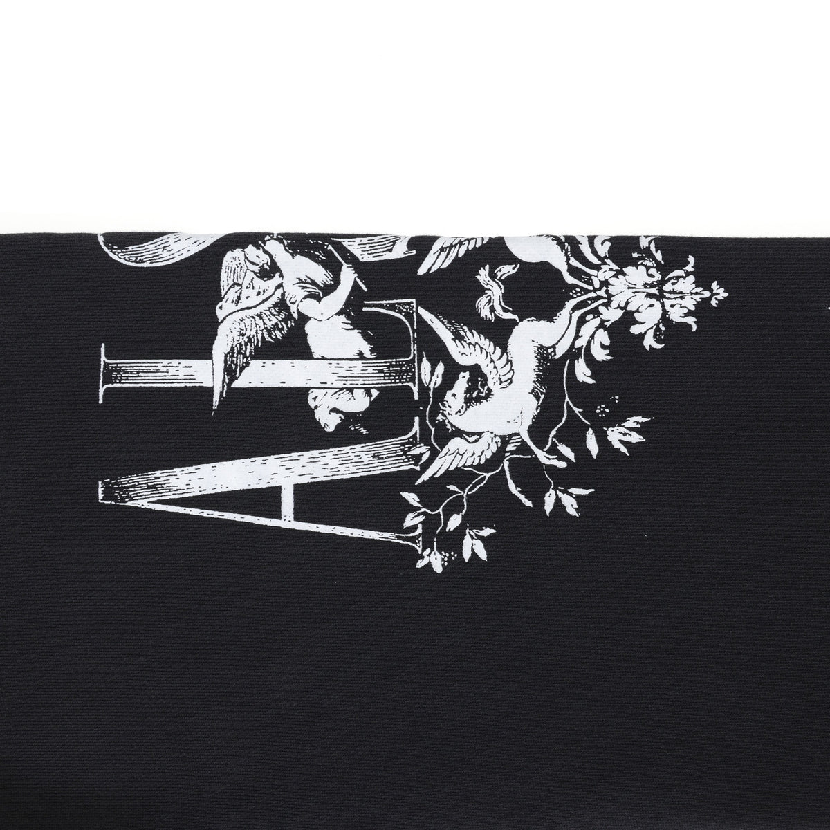 League Flare Sweatpants – Black – Close-up of white leg graphic with lettering, cherub, and winged figures