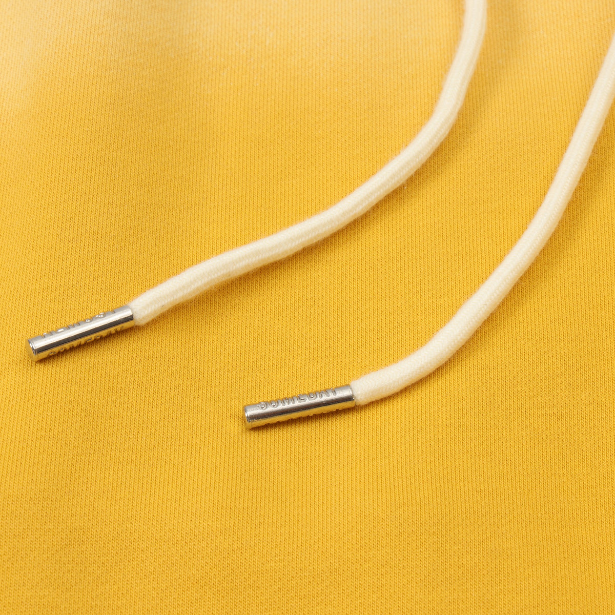 League Flare Sweatpants – Yellow – Close-up of white drawstrings with silver-tone metal tips