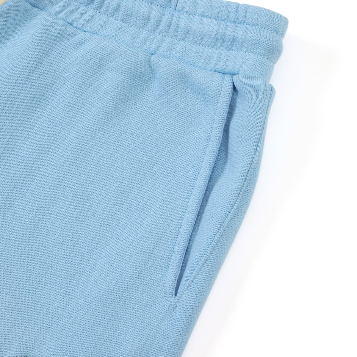 Members Flare Sweatpants – Light Blue – Close-up of side pocket opening and waistband