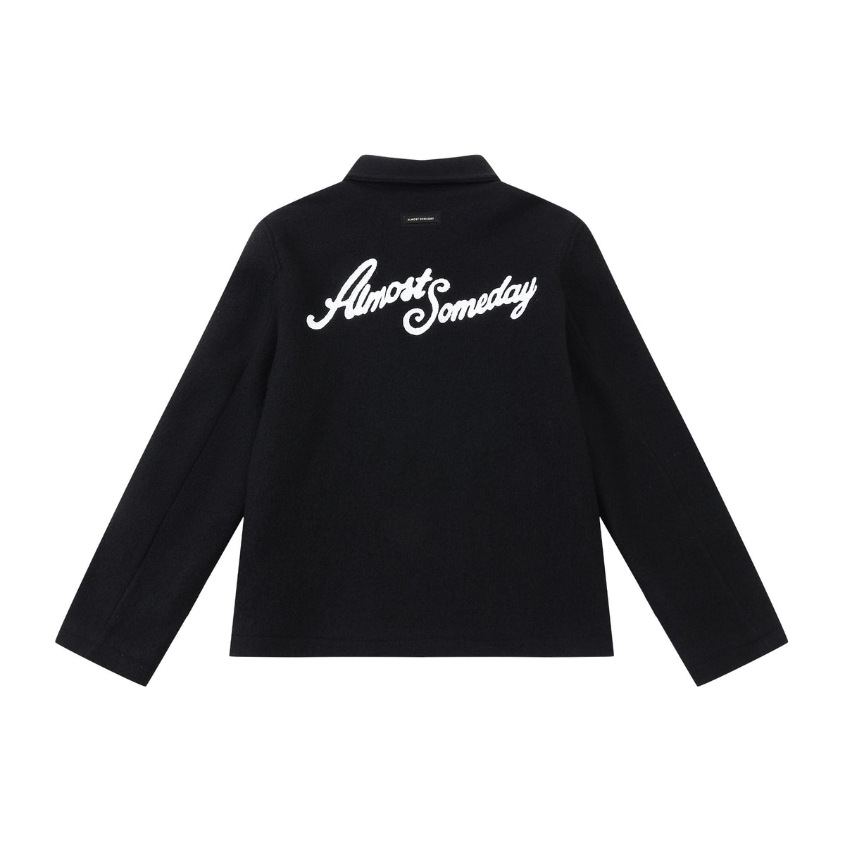 Saint Cropped Wool Jacket – Black – Back flat lay showing large white Almost Someday script