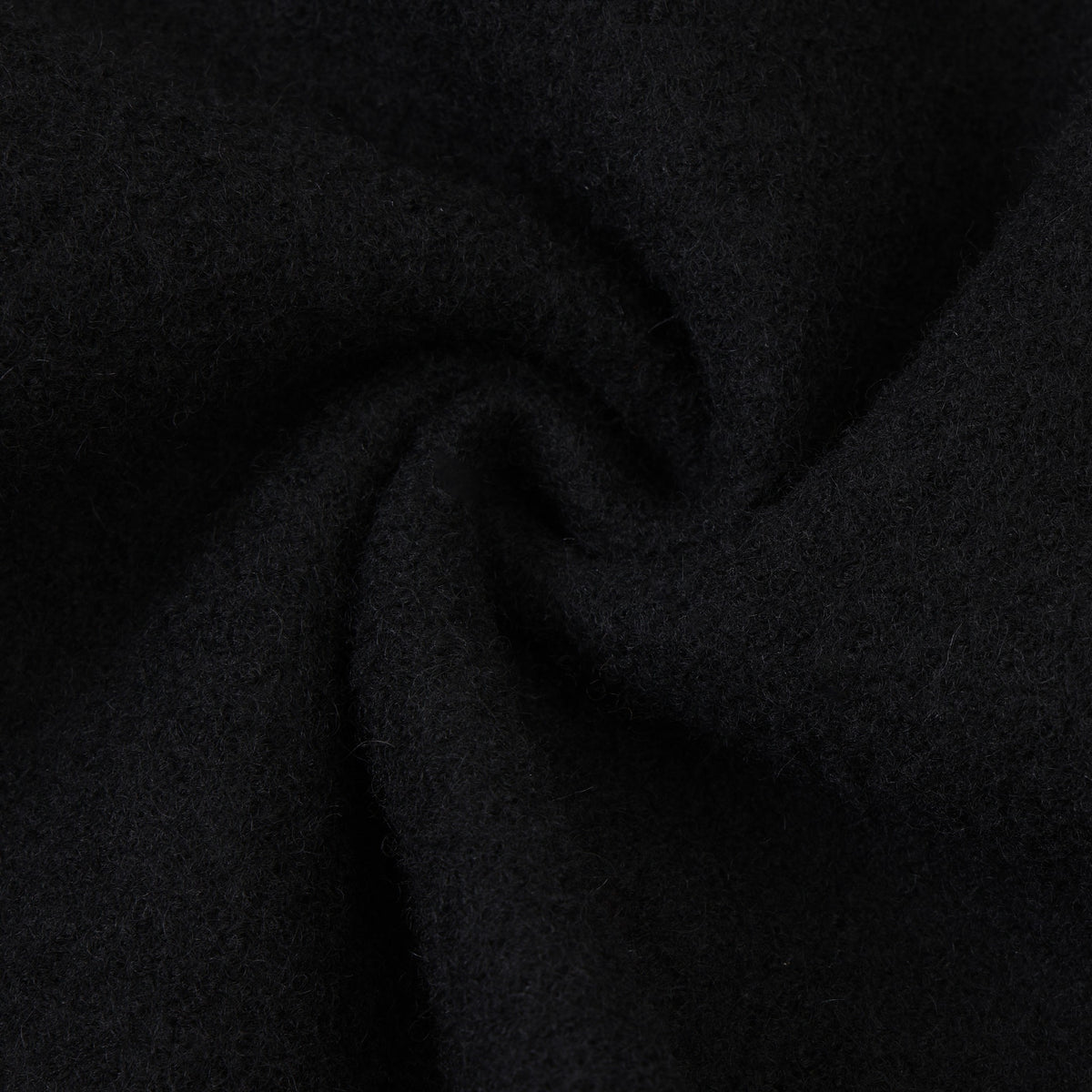 Saint Cropped Wool Jacket – Black – Close-up of black fabric twisted to show texture