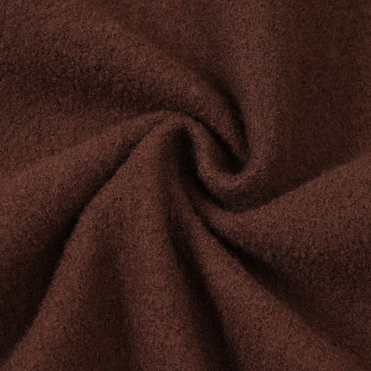 Saint Cropped Wool Jacket – Brown – Close-up of brown fabric twisted to show texture