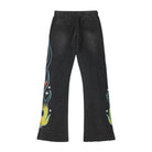 ALMOST SOMEDAY Outward Thermal Flares in Vintage Black, on-figure front view showing flame graphic running up both legs and cream rope drawstring