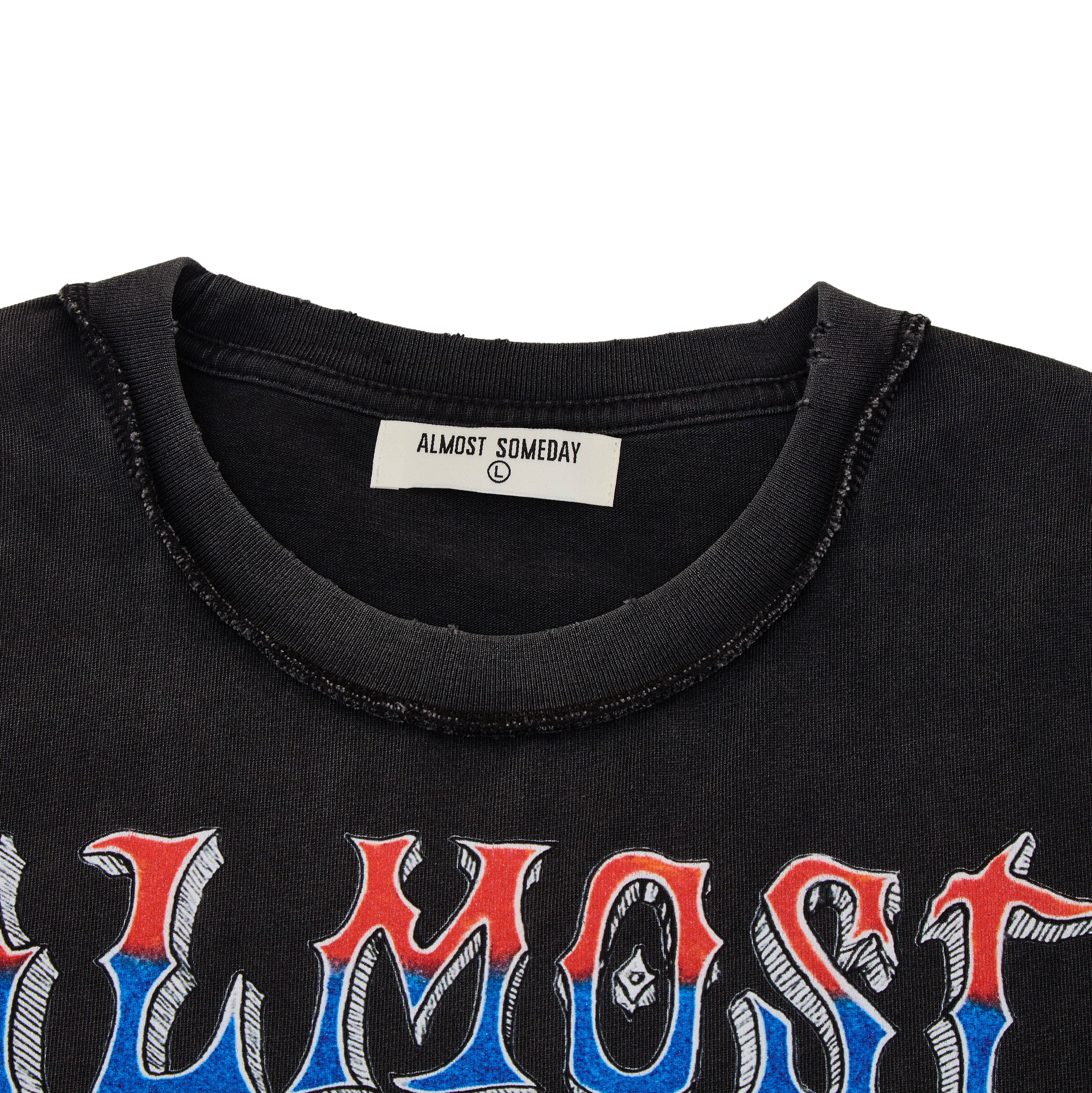 Black shirt with 'ALMOST SOMEDAY' text and brand label on a white background
