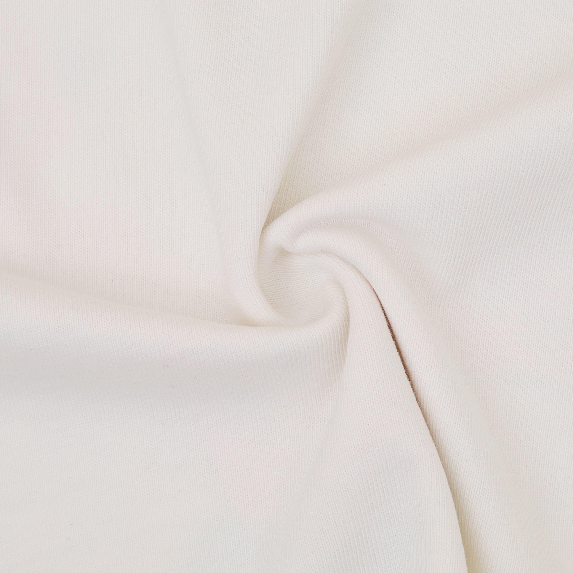 Close-up of beige fabric with a soft texture