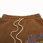 Brown sweatshorts with a colorful text design on a white background