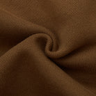 Close-up of brown fabric with a textured pattern