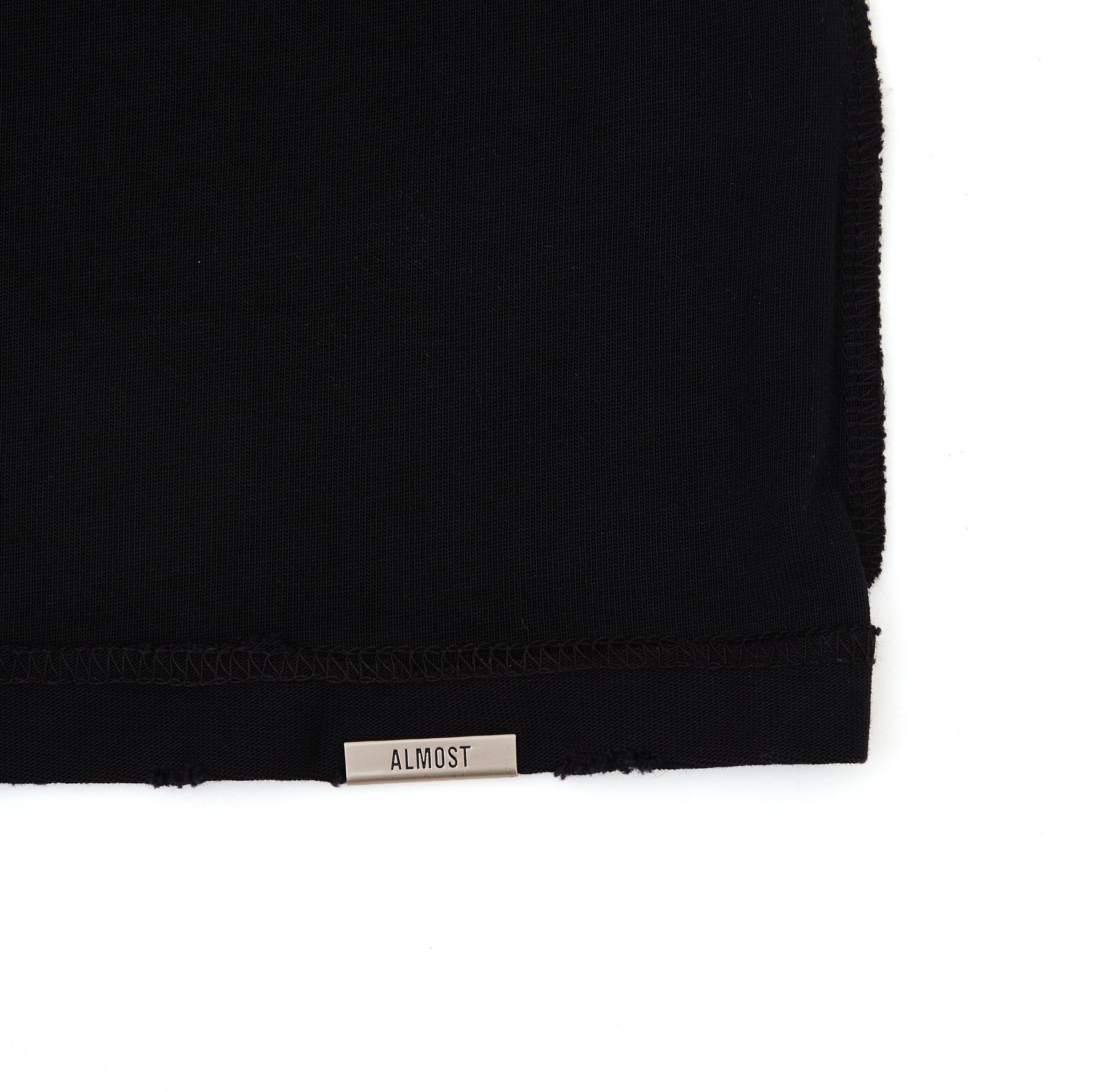 Black fabric with 'ALMOST' label on a white background