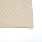Beige textured rug on a white background