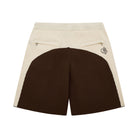 Beige and brown shorts with a logo on a white background