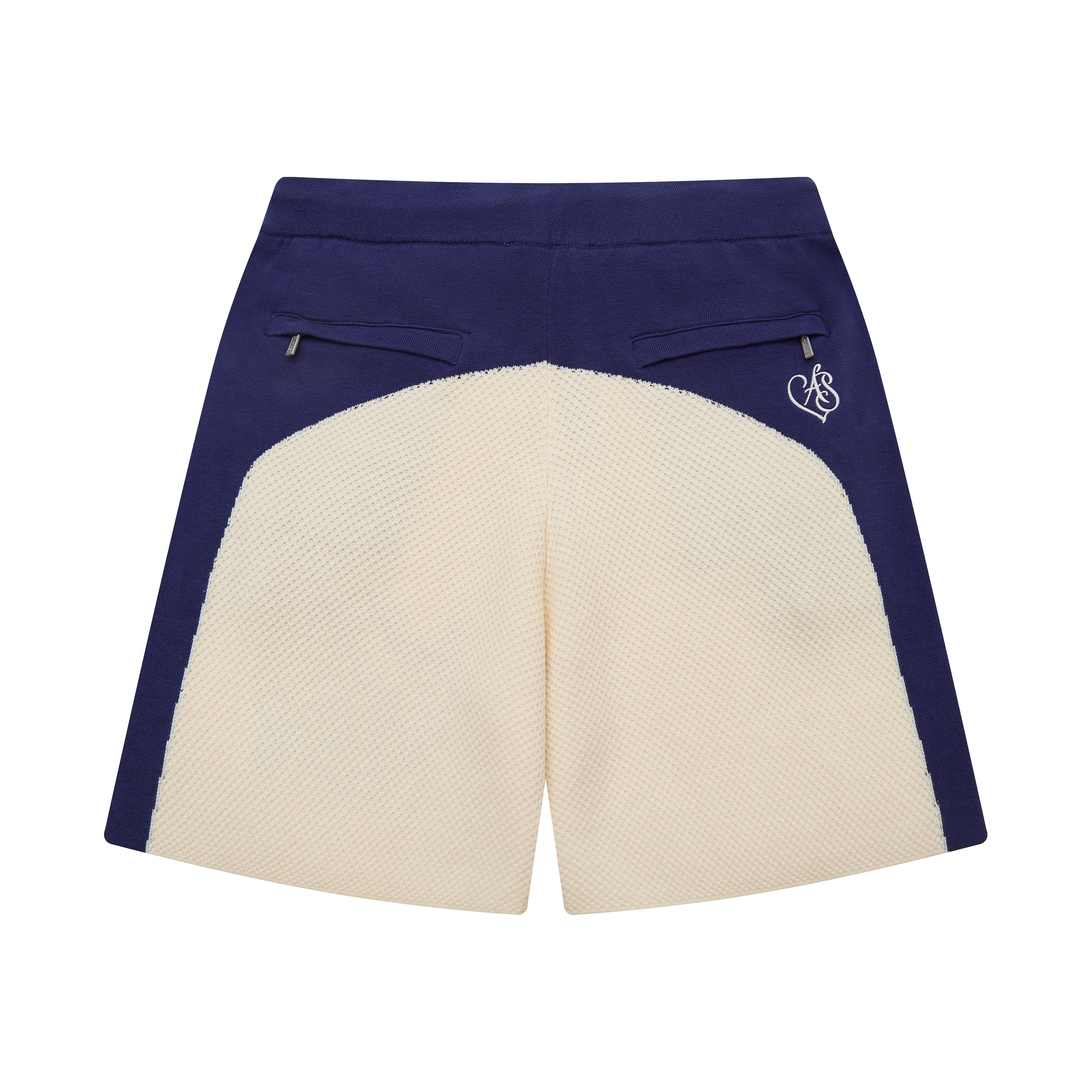 Navy and cream shorts with a logo on a white background