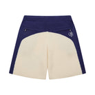 Navy and cream shorts with a logo on a white background