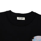 Black t-shirt with 'Almost Someday' label on a white background