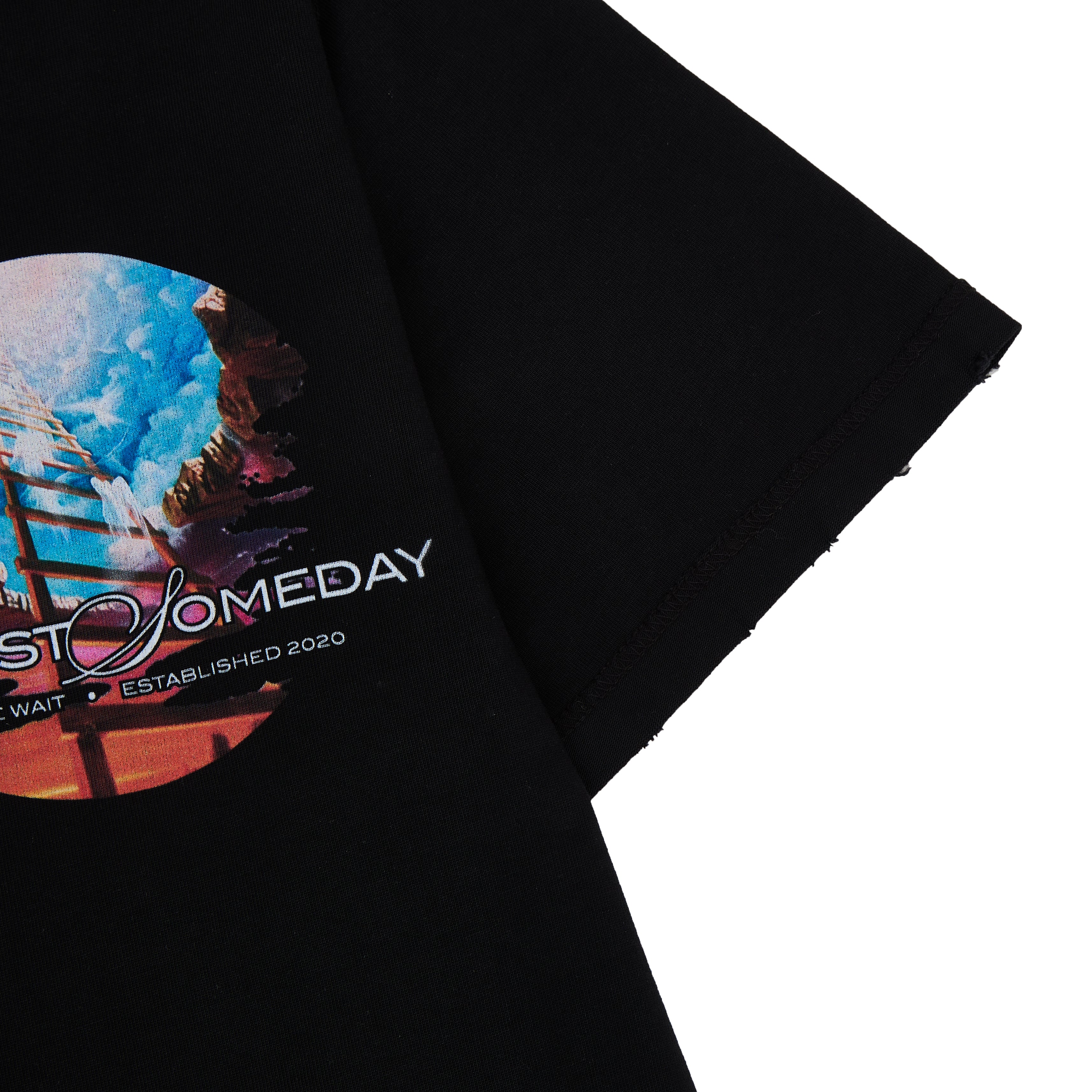 Black t-shirt with colorful graphic and text on a white background