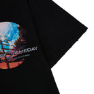 Black t-shirt with colorful graphic and text on a white background