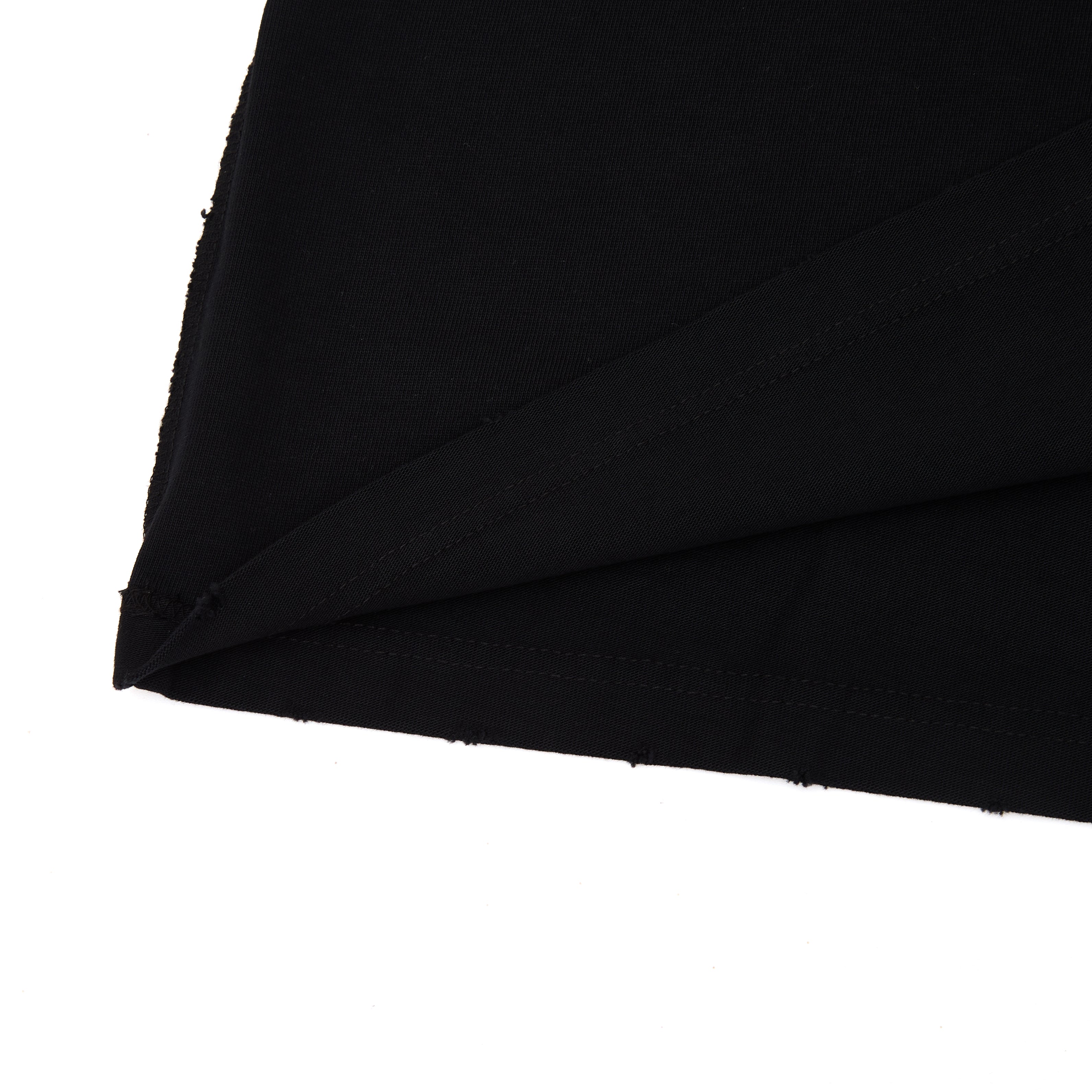 Black fabric texture on a white background