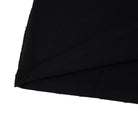 Black fabric texture on a white background