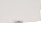 White tshirt with a 'ALMOST' label on a white background