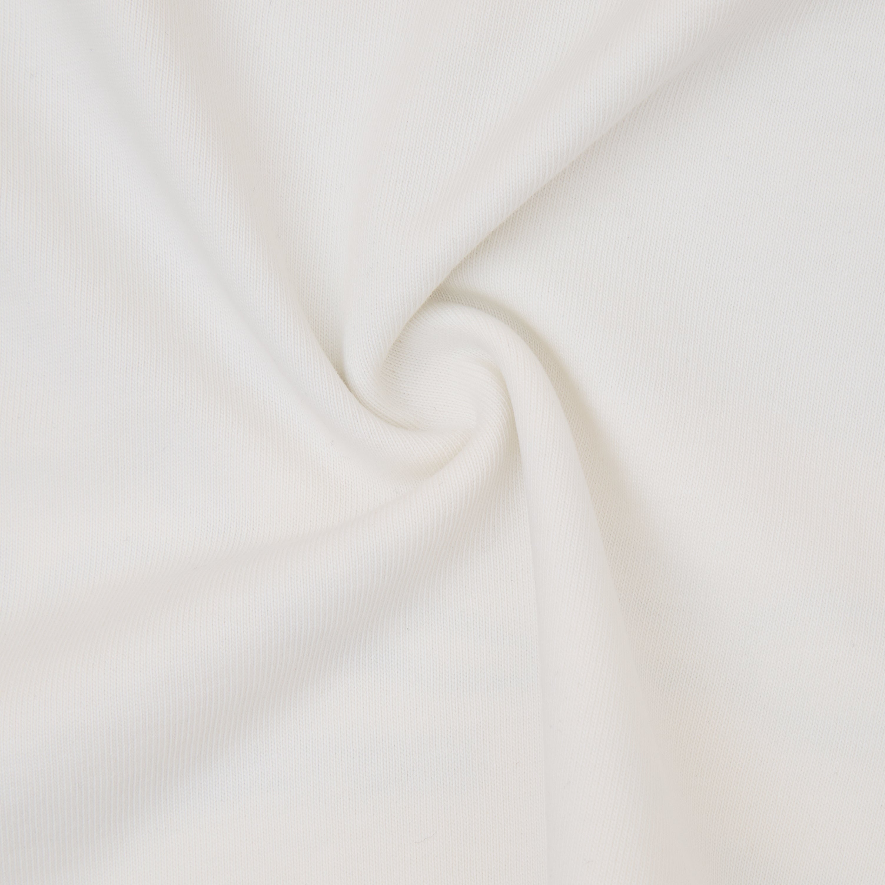 Close-up of white fabric with a subtle texture