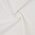Close-up of white fabric with a subtle texture