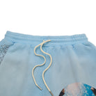 Light blue shorts with a drawstring on a white background