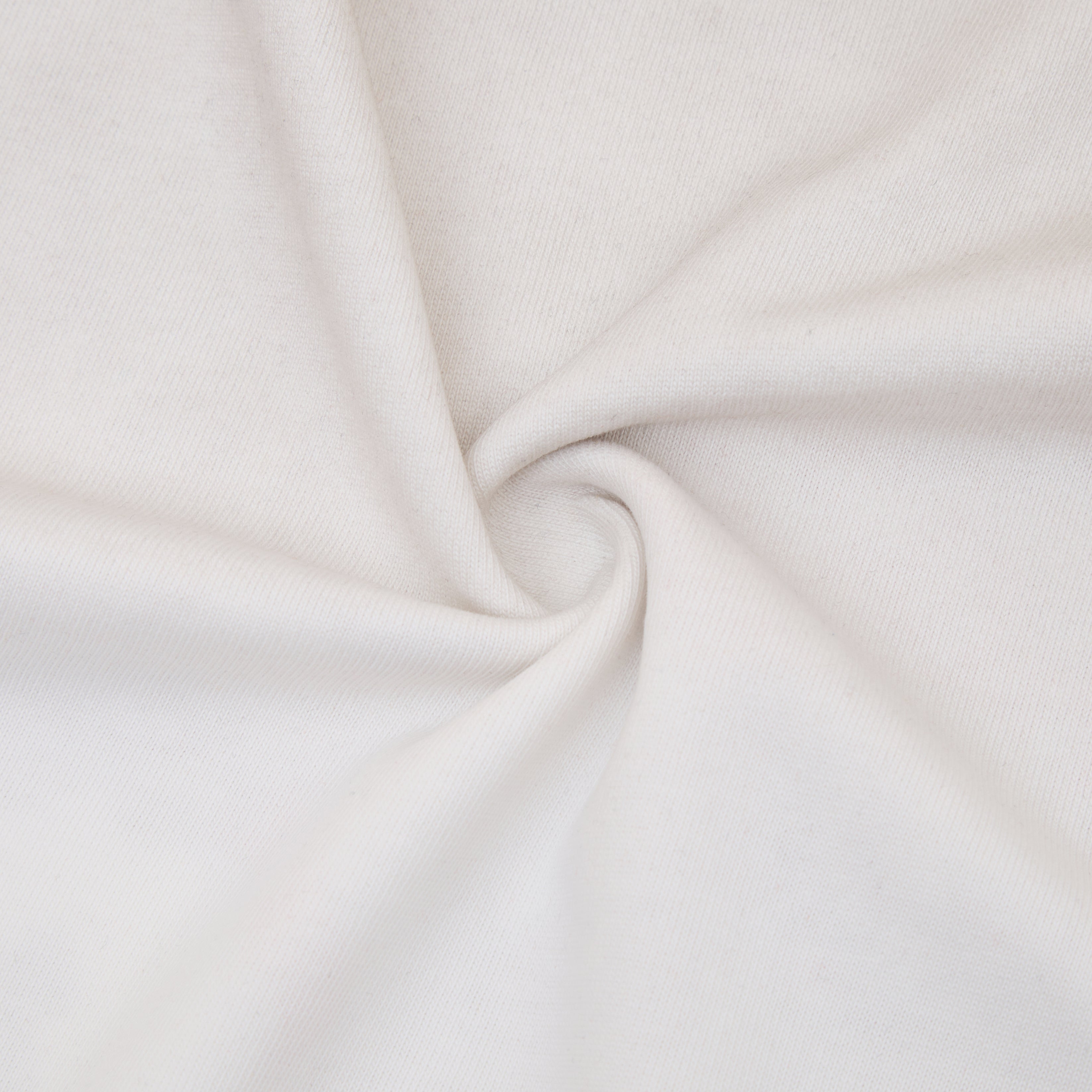 Close-up of white fabric with a subtle texture