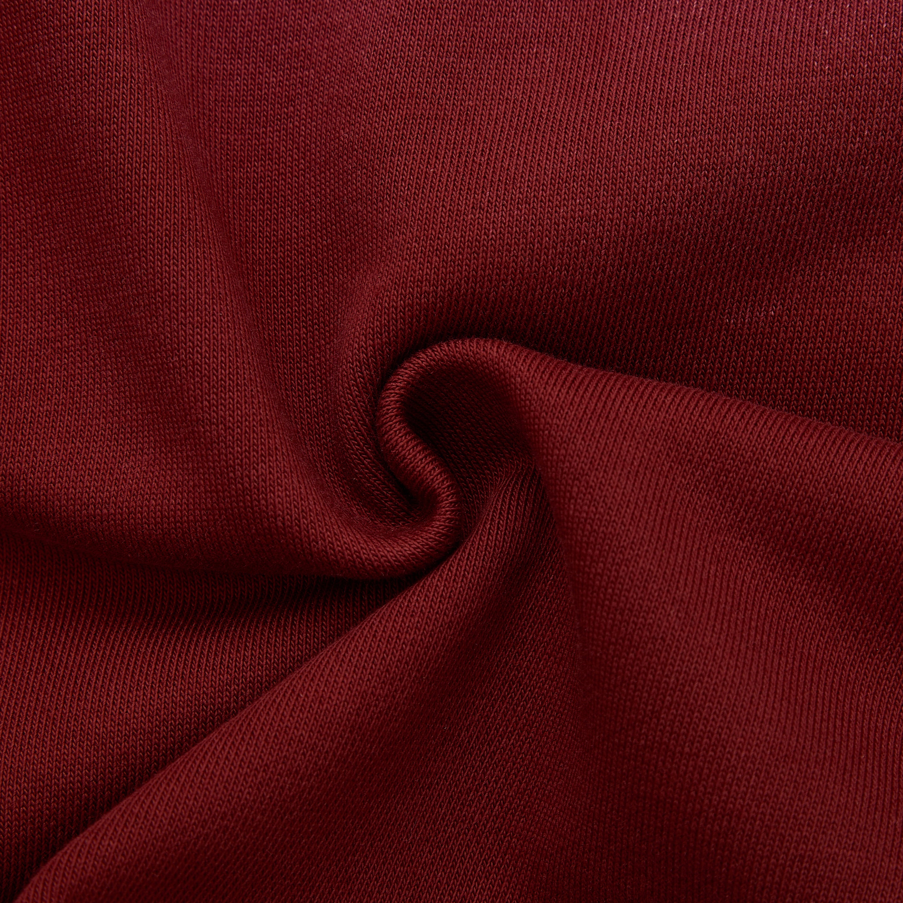 Close-up of red fabric with a visible texture