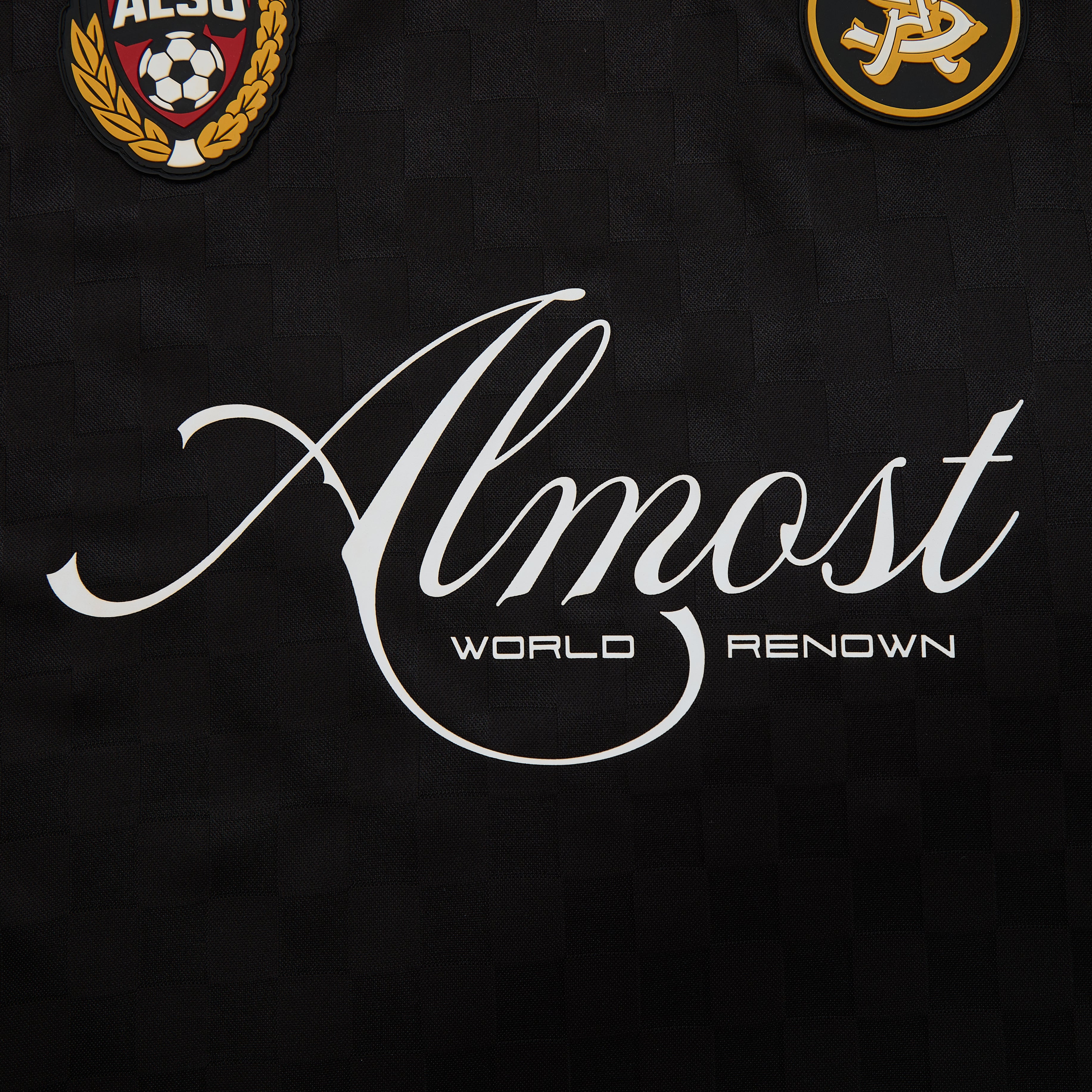 Black background with 'Almost World Renown' text and two logos.